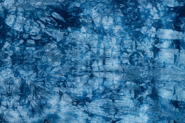 Padrão de tintura azul em pano de algodão, tecido tecido índigo e textura texturizada