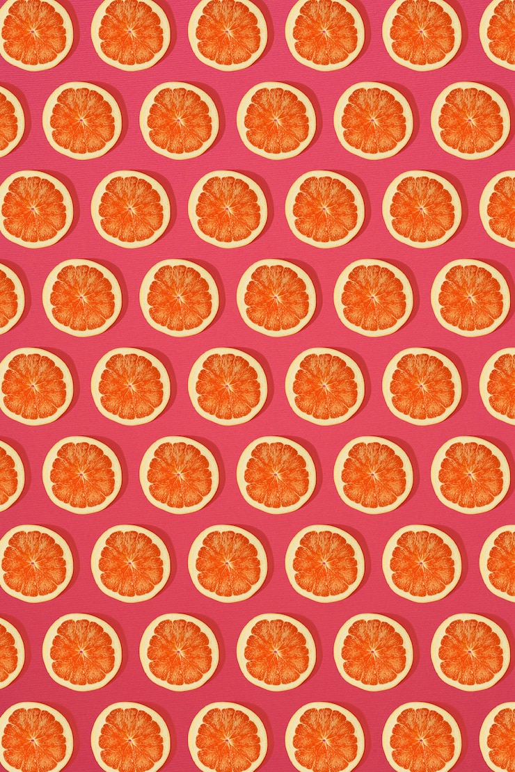 Foto padrão de toranja em fundo rosa. conceito de leigo plano mínimo. imprimir