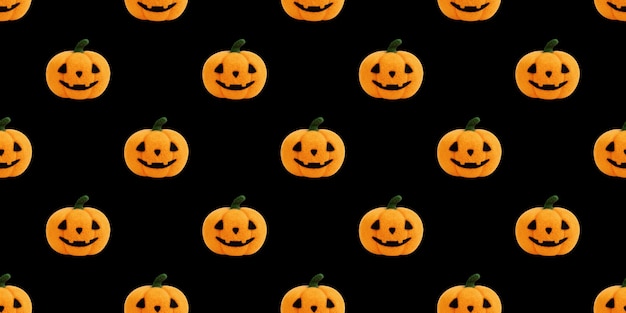 Padrão sem emenda com abóbora de halloween em fundo preto de lã.