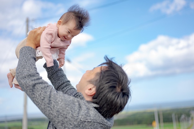 padre y larga carga en japón