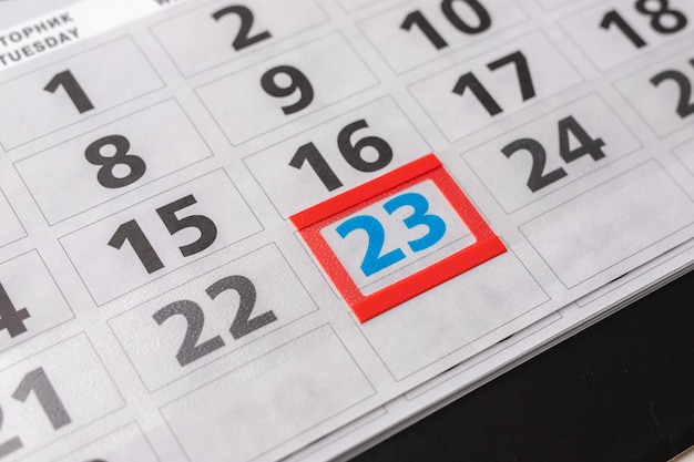 Página de calendario con fecha marcada de 23