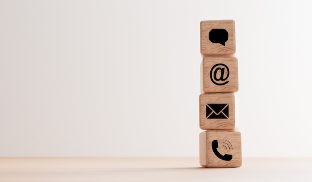 Página de contato do site comercial imprimir tela em cubo de bloco de madeira inclui telefone, endereço e e-mail e mensagem para contato do conceito de atendimento ao cliente de autoatendimento por renderização 3D.