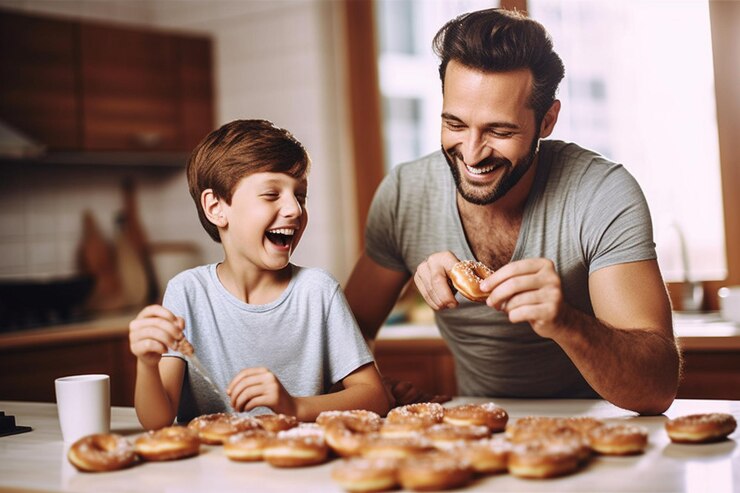 Foto pai e filho com donuts juntos na cozinha