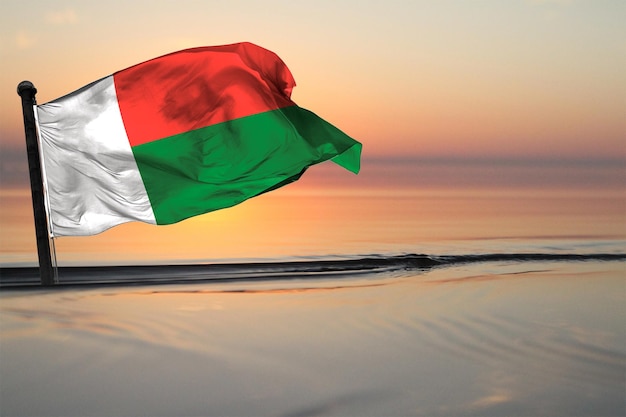 Un país de la bandera nacional de madagascar en un fondo de ver