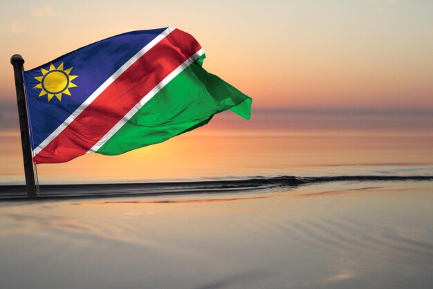 Un país de la bandera nacional de namibia en un fondo de ver