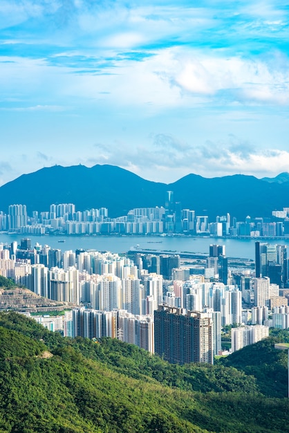 Paisagem da cidade do porto de victoria de hong kong, centro comercial urbano com torre de construção do horizonte, cena do distrito da ásia com vista da arquitetura de arranha-céus para viajar