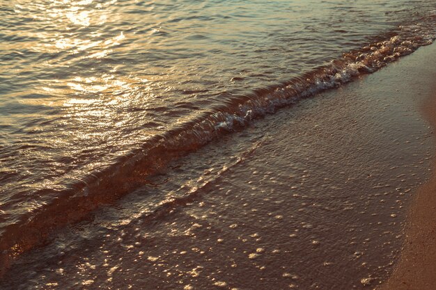 Paisaje con mar puesta de sol en la playa