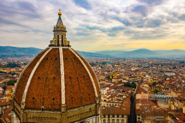 Foto paisaje urbano de florencia, toscana, italia, durante la puesta de sol en otoño