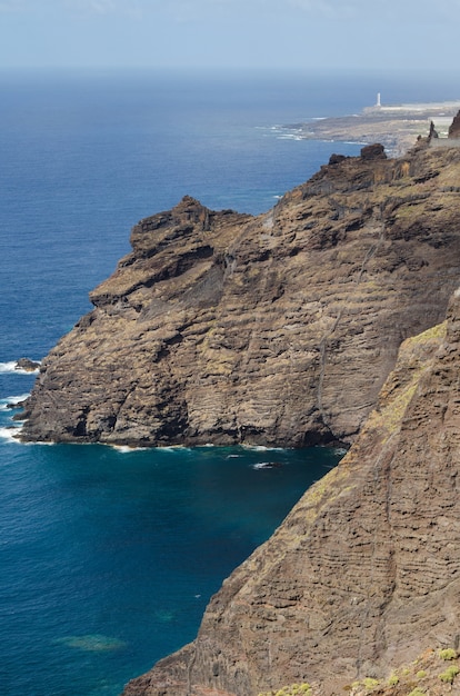 Paisaje volcánico de Tenerife y faro en el fondo, Tenerife, Islas Canarias, Sp