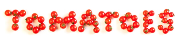 La palabra "tomates" escrito con tomates cherry frescos, aislado en blanco