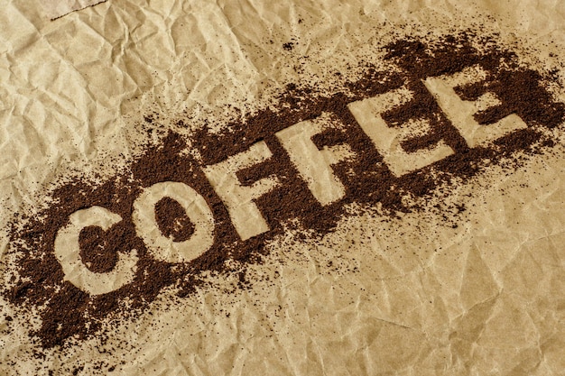 Palavra de café escrita em café em pó