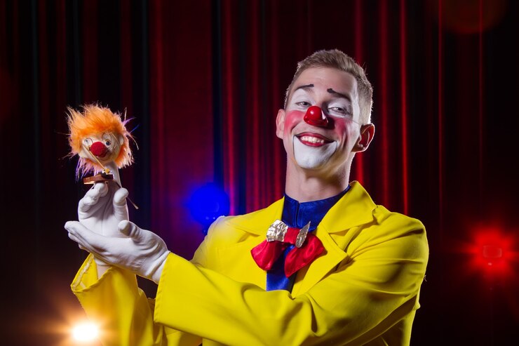 Foto palhaço de circo realiza número