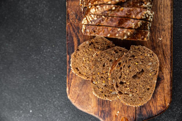 Foto pan de centeno horneado rebanada de semilla de girasol alimentos frescos alimentos saludables alimentos frescos de cocina aperitivo comida comida