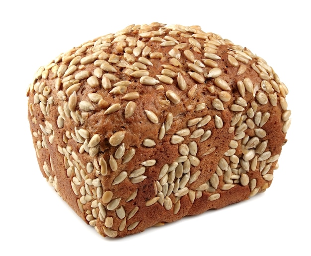 Pan fresco con semillas de girasol sobre un blanco
