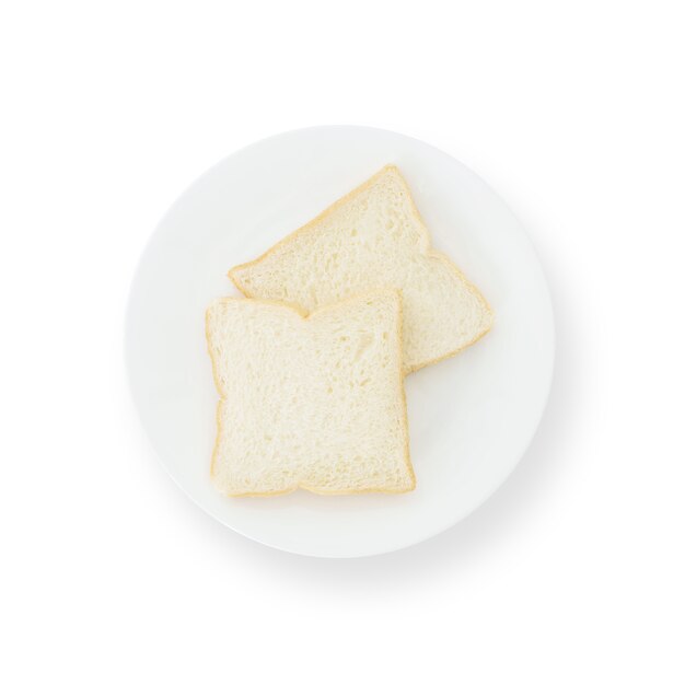 Pan de la rebanada del primer dos en el plato aislado en blanco