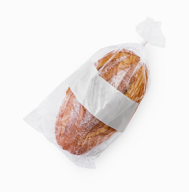 Pan recién horneado en una bolsa de plástico