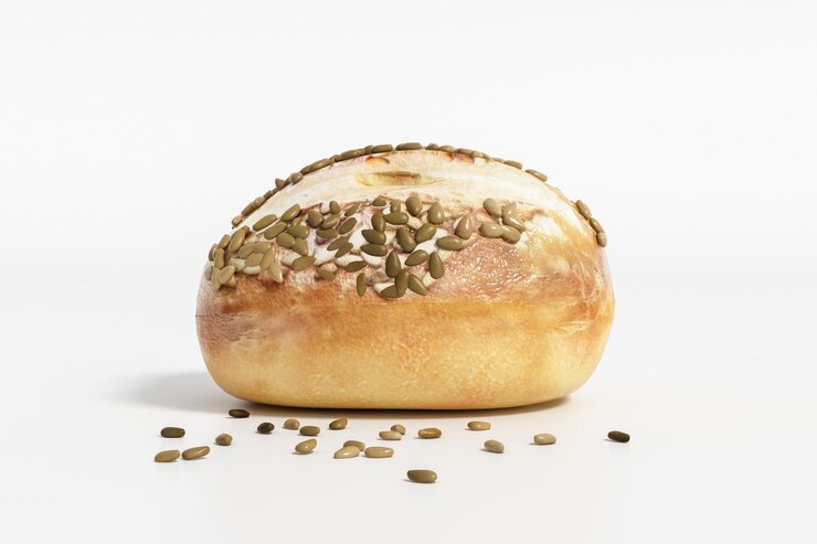 Pan con semillas de sésamo sobre fondo blanco.