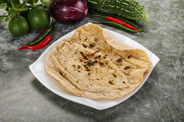 El pan tradicional indio de tandori Roti