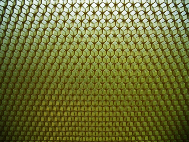 Panal de cera de textura hexagonal de fondo de una colmena de abejas