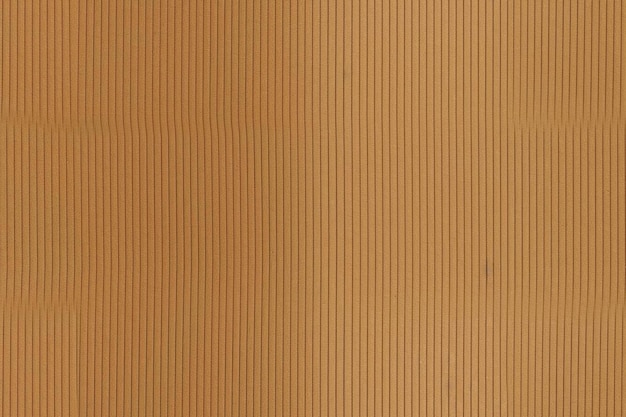 Foto un panel de madera con un fondo marrón y un fondo blanco.