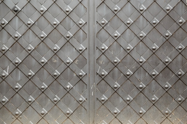Panel de metal vintage antiguo con fondo cuadrado de marco de patrón celular ornamental decorativo.