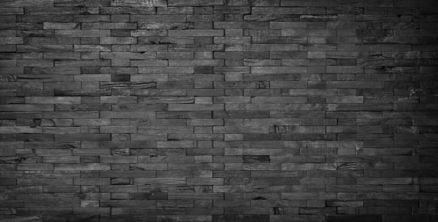 Panel de pared de textura de madera negra hecho de tablas viejas