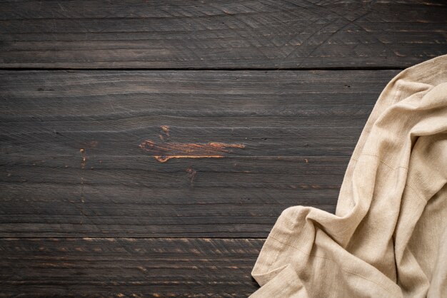 Foto paño de cocina (servilleta) sobre fondo de madera