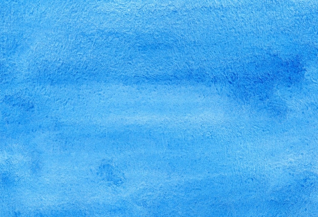 Pano de fundo abstrato azul aquarela pintado à mão em papel texturizado