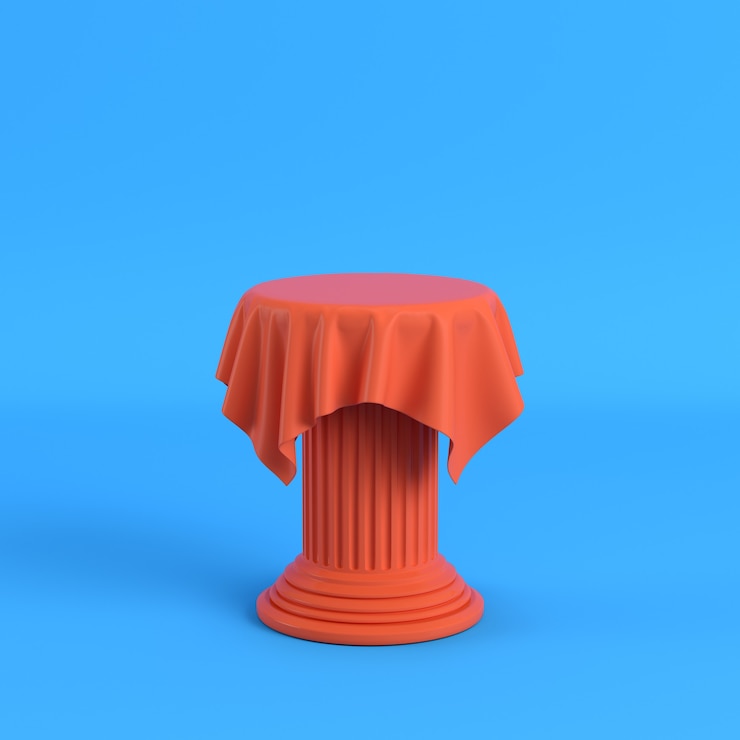 Foto paño naranja sobre un pedestal sobre fondo azul brillante