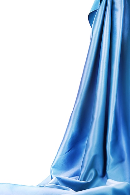 Foto paño de seda azul aislado en blanco