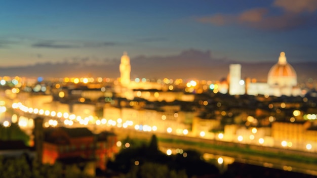 Panorama nocturno borroso de la ciudad vieja de Florencia, Toscana, Italia