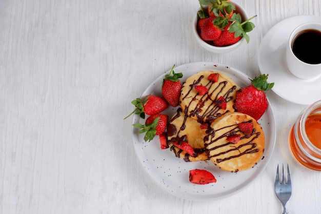 panqueque con chocolate y fresa