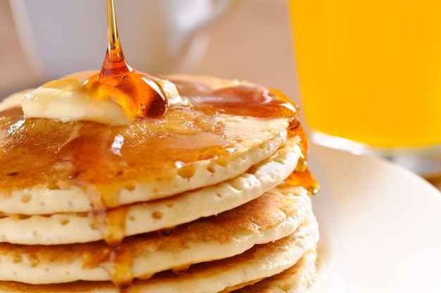 Foto panqueques con jugo de naranja y café