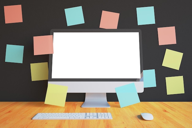 Pantalla de computadora blanca con pegatinas