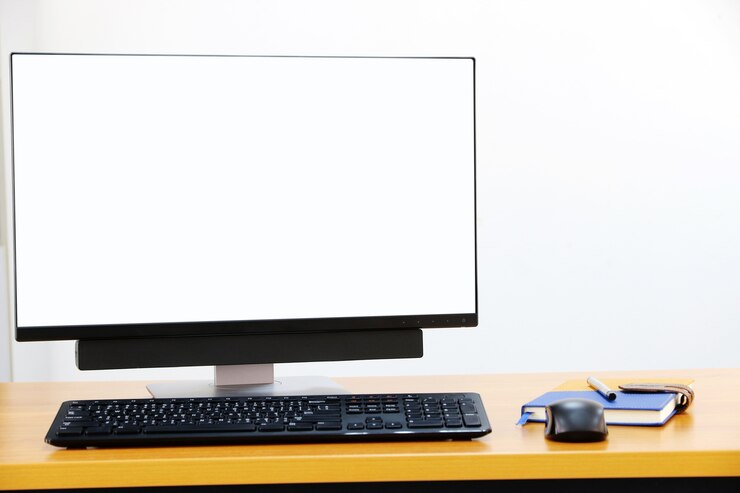 Foto pantalla de computadora en el escritorio de negocios