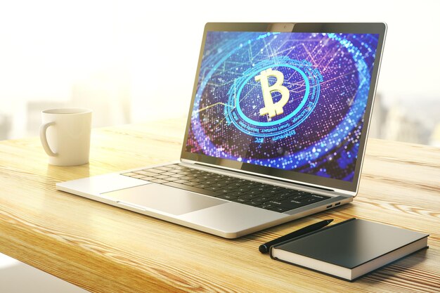 Pantalla de computadora moderna con concepto creativo de minería de hologramas de símbolos de bitcoin y blockchain