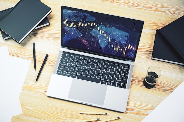 Pantalla de computadora moderna con gráfico financiero creativo abstracto con concepto de análisis e investigación de mapas mundiales Representación 3D