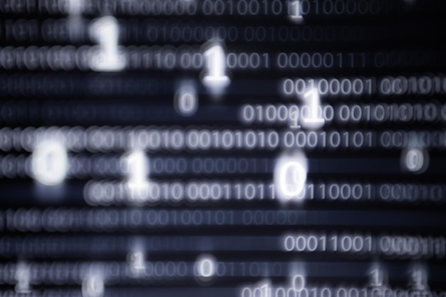 Pantalla de pantalla de computadora de imagen de datos grandes abstractos con código binario moviéndose en el fondo