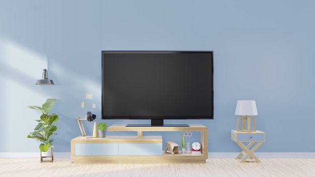 Pantalla de tv en plantas modernas de habitación y lámparas. decoración en fondo azul de la pared posterior | Foto Premium Pantalla De Tv En Plantas Modernas De Habitación Y Lámparas. Decoración En Fondo Azul De La Pared Posterior | Foto Premium