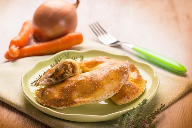 Panzerotti com foco seletivo de legumes