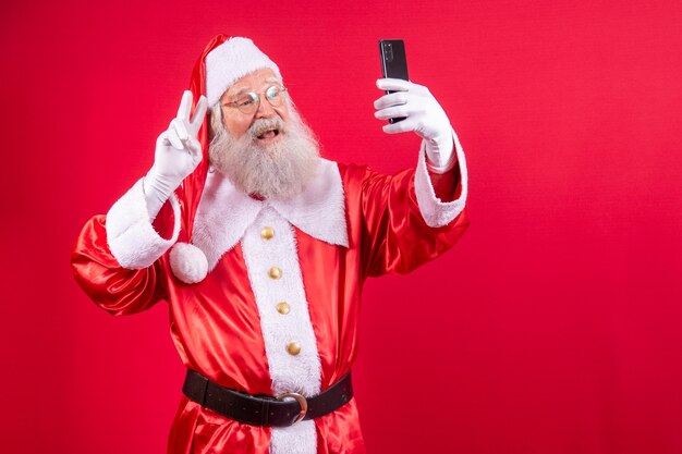 Papai Noel fazendo selfie com o smartphone