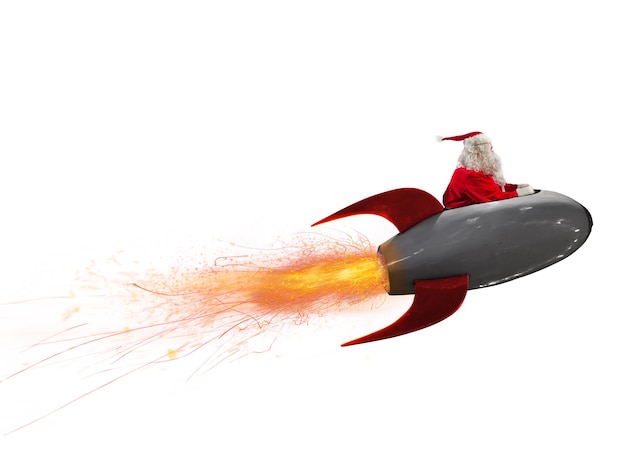 Foto papai noel voa rápido por um foguete de energia para entregar presentes de natal