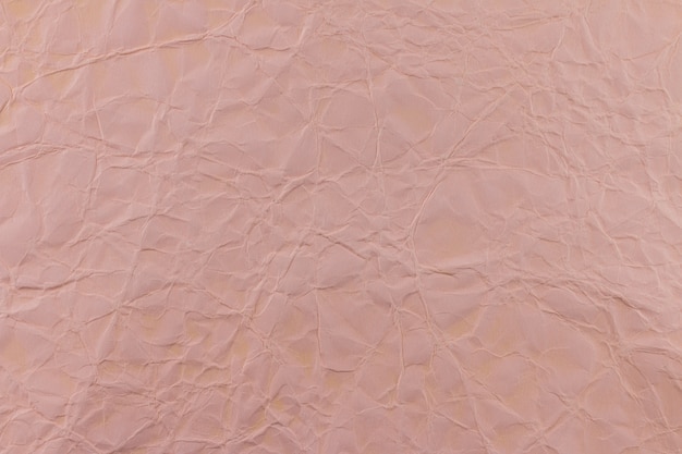 Papel arrugado rosa, usado como fondo