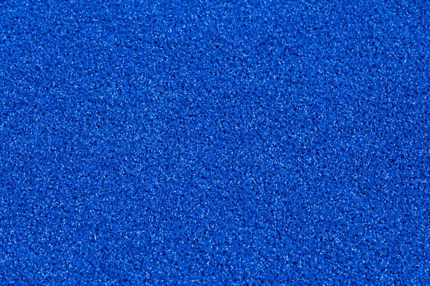 Papel de parede de fundo de tapete azul closeup