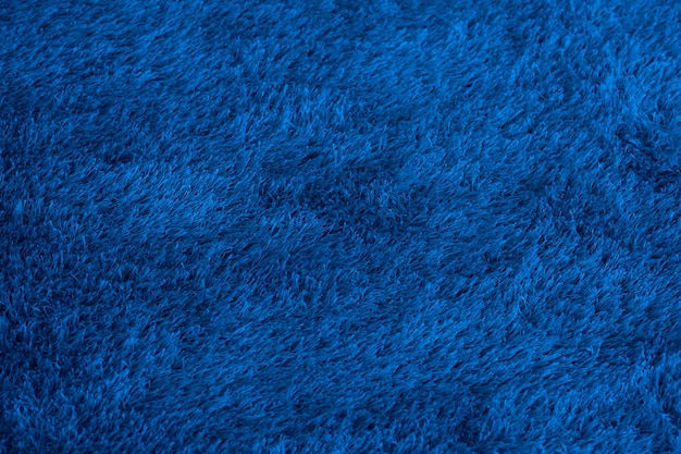 Papel de parede de fundo de tapete azul closeup