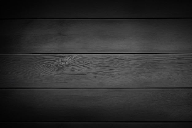 Papel de parede de madeira preta com fundo escuro e uma fonte de luz