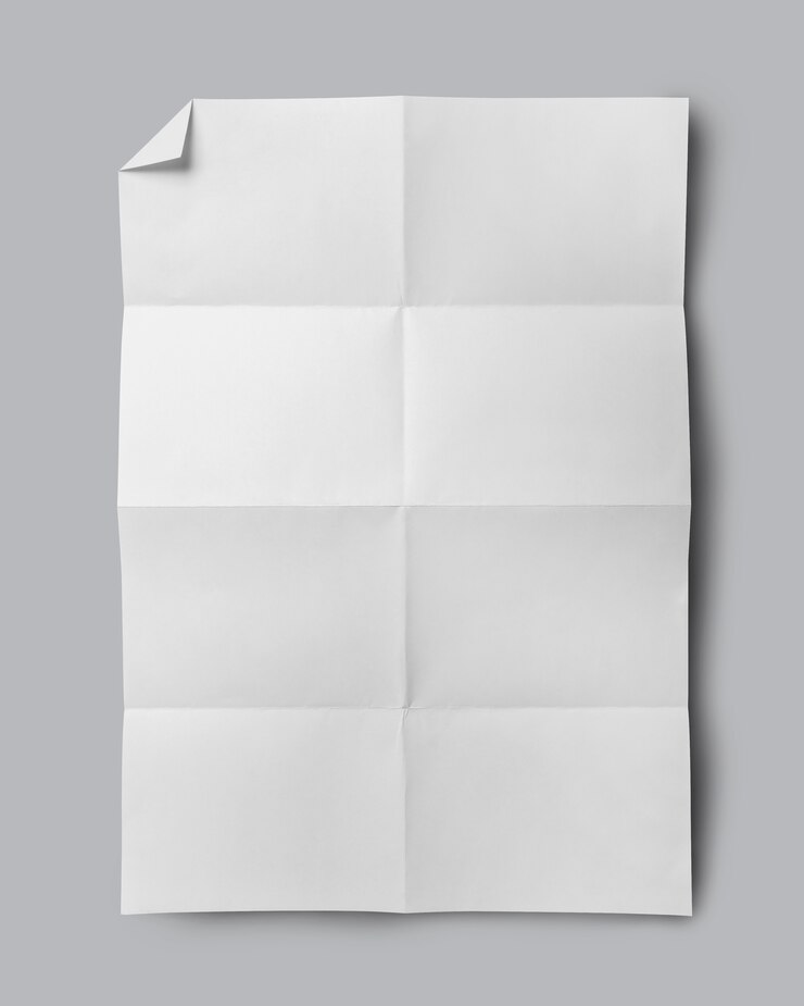 Foto papel dobrado branco isolado em fundo cinza