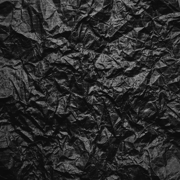 Papel kraft negro arrugado Textura de papel reciclado negro arrugado