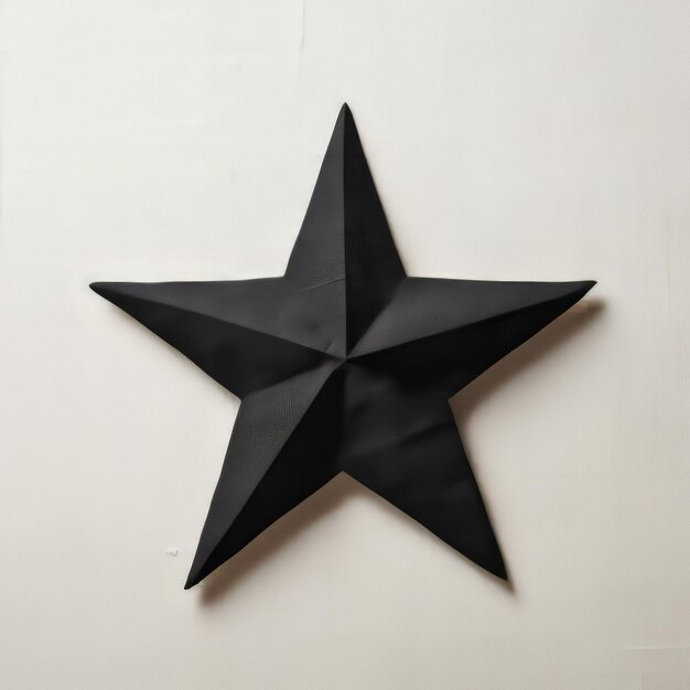 Foto el papel negro de la estrella colgado en la pared inspirado por david hammons