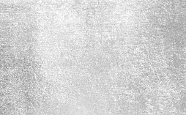 Foto papel de papel plateado brillante con una textura elegante de hoja de fondo